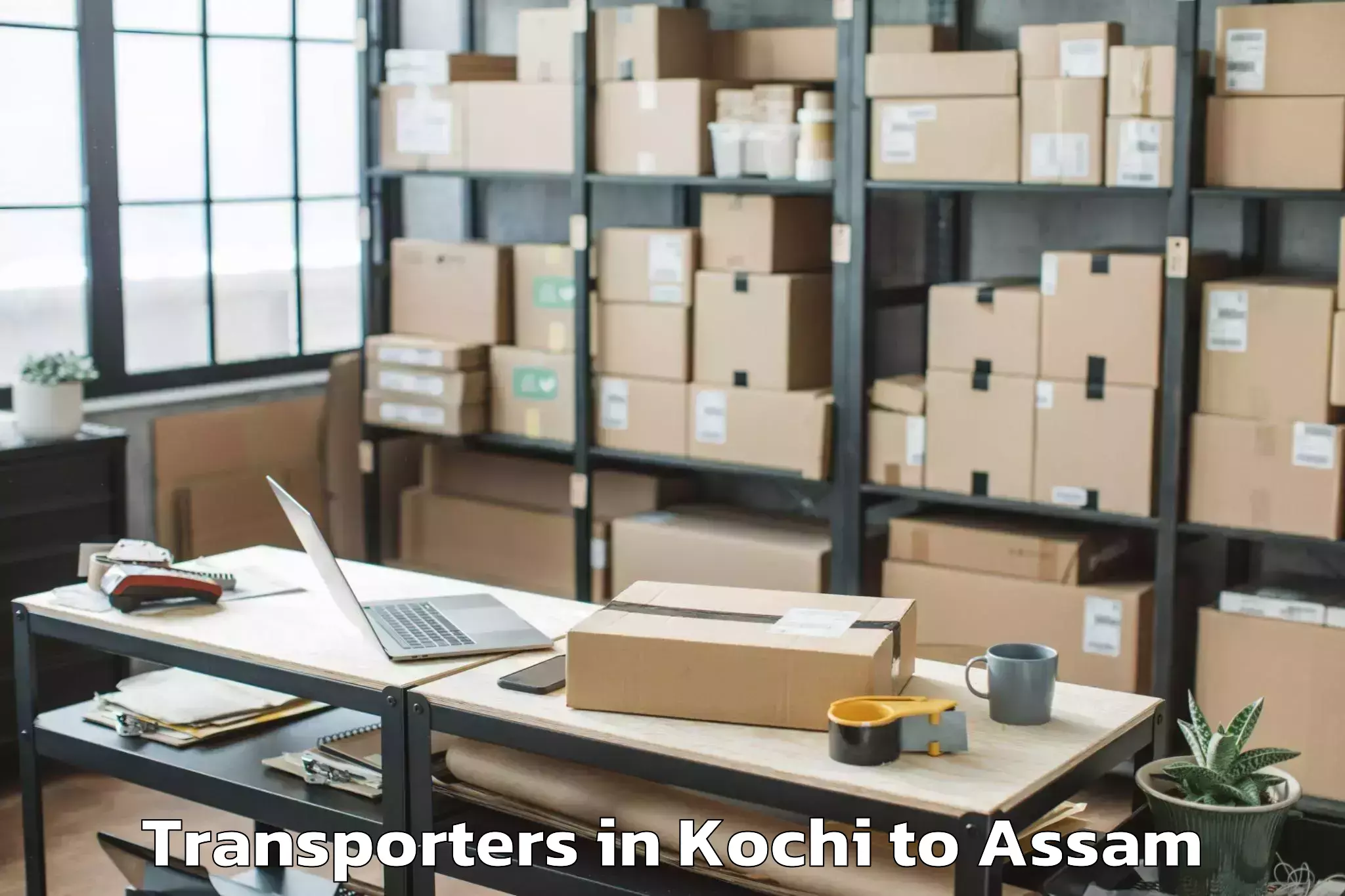 Book Kochi to Bilasipara Pt Transporters Online